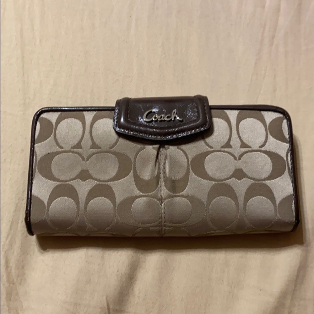 Coach wallet with snap closure